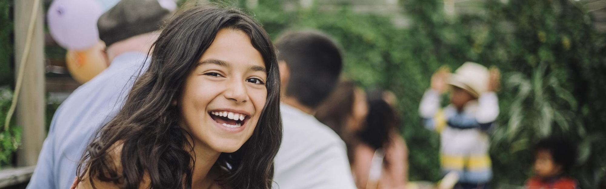 Smiling girl in birthday party